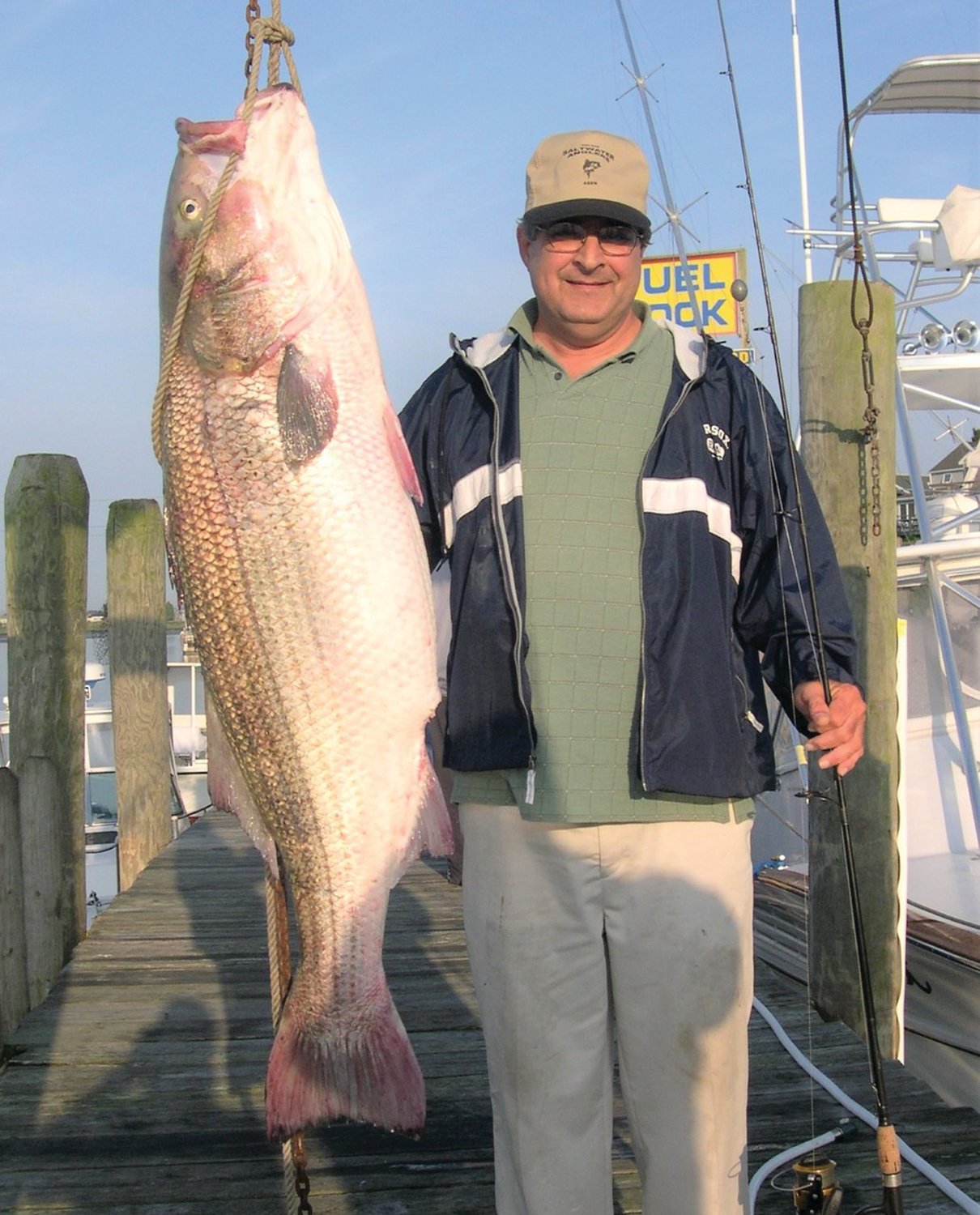 OLD SALTS AND YOUNG GUNS: Peter Vican’s 77-pound, 6.4 once striped bass is Rhode Island’s State record. Vican will be one of the guest speakers Monday, July 25 at a RI Saltwater Anglers Association seminar.